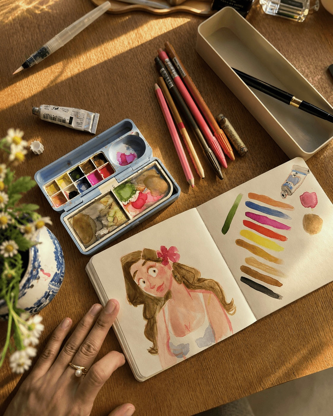 Two watercolour figures in pink and rose tones