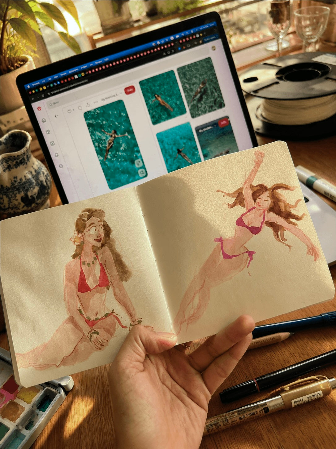Watercolour sketchbook — Thailand travel scene with mountains and market